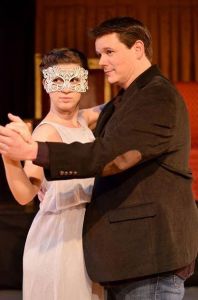 Ophelia (Chelsie Lloyd) waltzing with Hamlet (Michael J. Dombroski) at the wedding reception of Gertrude and Claudius