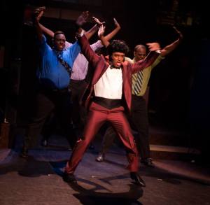 Wailin Joe (center-David John Little) and male ensemble dancers of Memphis