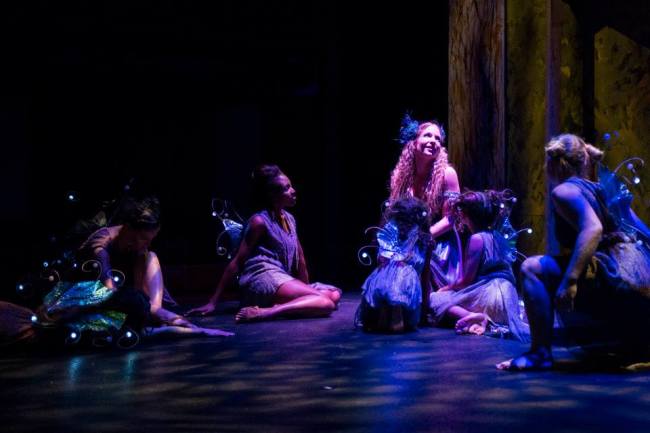 Titania, Queen of the Fairies (center- Kathryn Elizabeth Kelly) holds court with her fairies in A Midsummer Night's Dream at Chesapeake Shakespeare Company