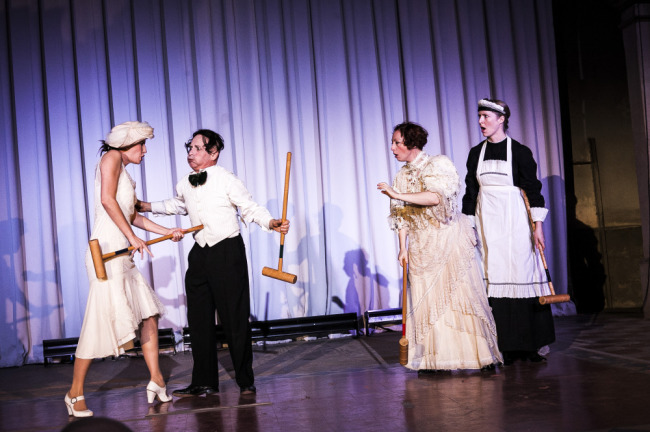 The rules of Croquet as explained by Happenstance Theatre (l to r) Sarah Olmsted Thomas, Mark Jaster, Sabrina Mandell, and Gwen Grastorf