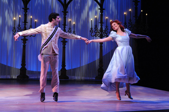 Prince Eric (Joe Chisholm) teaches Ariel (Lara Zinn) how to dance.