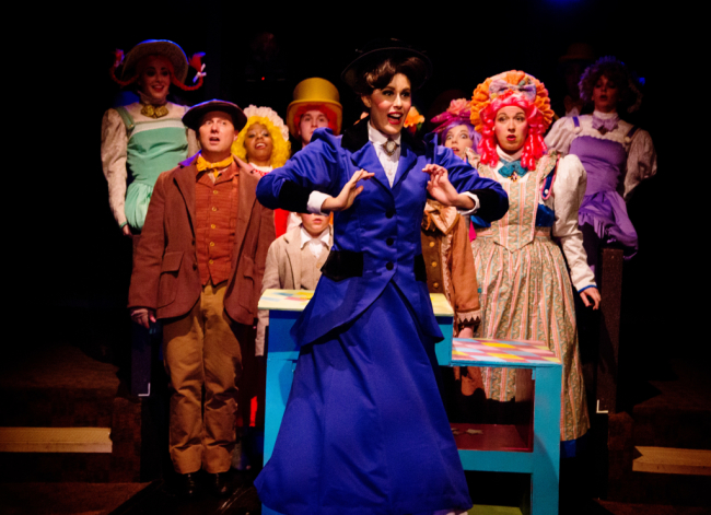 Mary Poppins (Center- Maura Hogan) with Bert (Front Left- Jeffrey Shankle) and Mrs. Corry (Front Right- Coby Kay Callahan) about to sing "Supercalifragilisticexpialidocious"