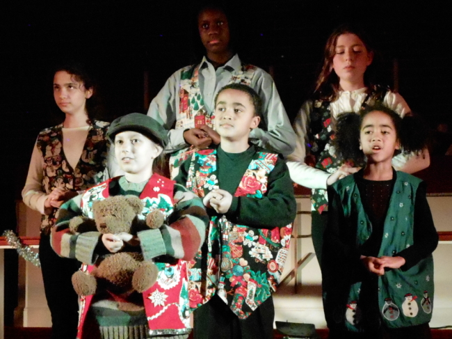 (l to r) Hope Cratchit (Emilee Schmidt) Tiny Tim (Sophia Nasreen Riazi-Sekowski) Little Boy (Malachi Wilson) April (KiAnna Nycole Dorsey) Joy Cratchit (Samantha Roberts) and Little Girl (Simone Wilson) 