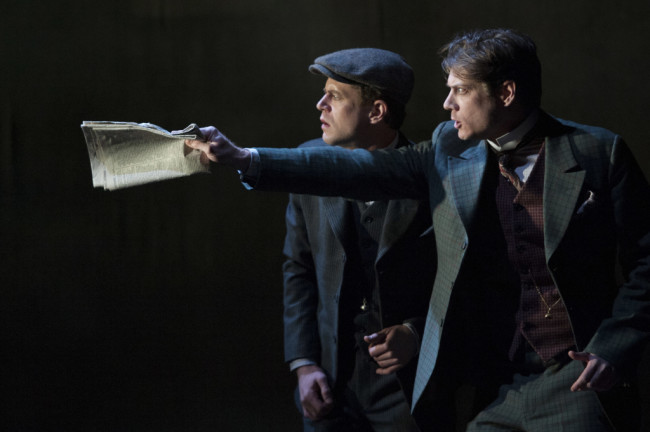 (L to R) Lucas Hall as Doctor Watson and Gregory Wooddell as Sherlock Holmes in Ken Ludwig’s Baskerville: A Sherlock Holmes Mystery at Arena Stage at the Mead Center for American Theater, January 16-February 22, 2015.