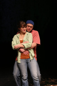 Sarah (L- Kathryn Zoerb) and Brian (R- Travis Hudson) embrace in Sarah's front yard.