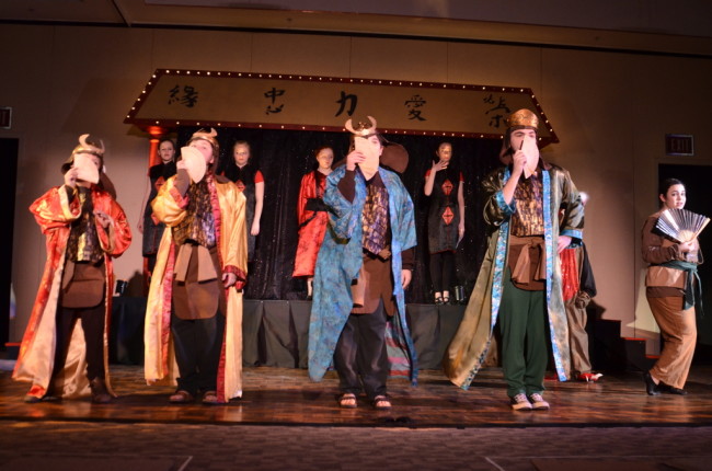 Ling (Steven Gross) Yao (Graham Rifkin) Qian-Po (Jules Einhorn) Captain Shang (Jake Zeranko) and Mulan (Eva Hellerbach) prepare to fool the Huns.