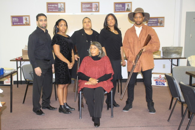 (L to R) Ben Harris as Frank Charles, Brawnlyn Blueitt as Minnie Dove Charles,  Kecia Campbell as Sophie Washington,  Lolita Marie as Fannie Dove, Darius McCall as Wil Parish. Seated is Sandra Cox True who plays Miss Leah.