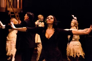 Priscilla Cuellar as Morticia Addams (center) dancing the "Tango De Amor" in The Addams Family at Toby's Dinner Theatre