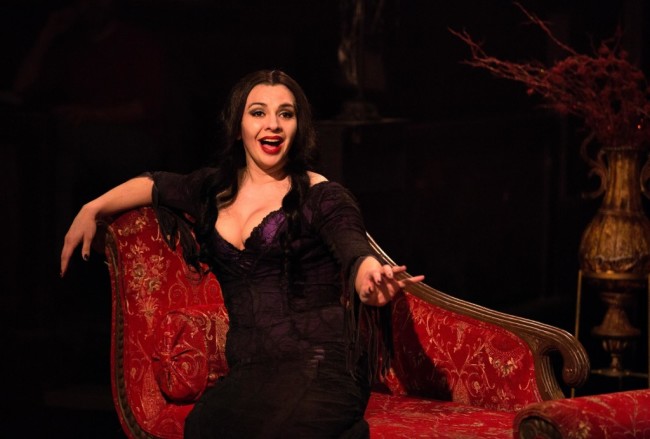 Priscilla Cuellar as Morticia Addams singing "Secrets" in The Addams Family at Toby's Dinner Theatre