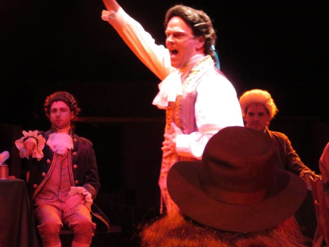 Dan Felton as Edward Rutledge (center) singing "Molasses to Rum" in 1776 at Toby's Dinner Theatre