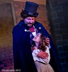 Lee Lewis (left) as Jean Valjean and Amelia Moss (right) as Little Cosette in Les Miserables