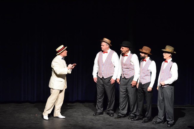 Professor Harold Hill (L- E. Lee Nicol) and The Quartet (R- Harbor City Barbershop Quartet)