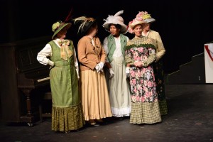 Female Ensemble Members in the glorious costumes by Lynn Kellner and marvelous hats by Mary Gorman