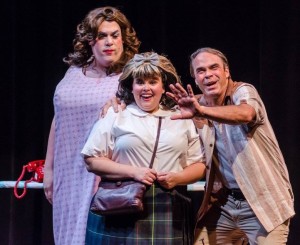 Roger Schulman (left) as Edna Turnblad, Amy E. Haynes (center) as Tracy Turnblad, and Greg Guyton (right) as Wilbur Turnblad