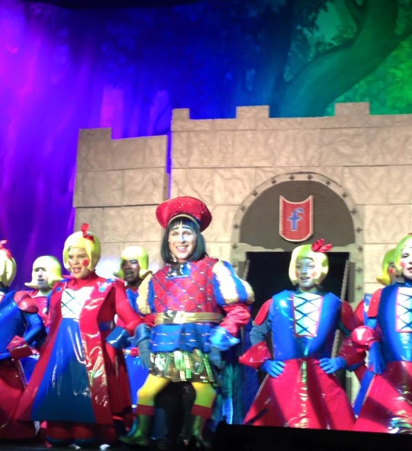 Homero Bayarena as Lord Farquaad (center) and the Duloc Dancers in Shrek the Musical