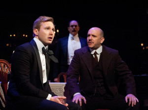 Josh Adams (left) as Eric Birling, Bruce Randolph Nelson (center) as Arthur Birling, and Chris Genebach (right) as Inspector Goole in An Inspector Calls at Everyman Theatre