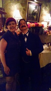 TheatreBloom Editor Amanda N. Gunther (left) stands with actor Jose de la Mar (right) playing Edgar Allan Poe in Poe's Last Stanza