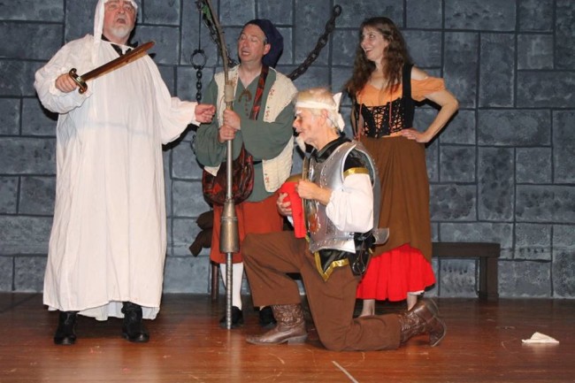 (L to R) Rodney Bonds as The Innkeeper, Paul Ballard as Sancho Panza, Michael Hulett as Don Quixote, and Ruth Hulett as Aldonza