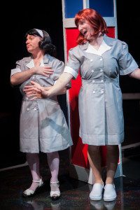 Matt Wetzel (left) as Helen Bedd and Adam Abruzzo (right) as Inita Goodwin in A Tuna Christmas at Spotlighters Theatre