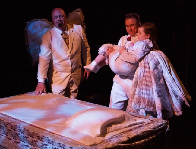 David Bosley-Reynolds (left) as Joseph with David James (right) as Clarence carrying Zuzu to bed in It's a Wonderful Life: The Musical