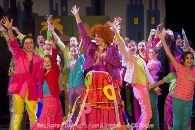 Rachel Miller (center) as Mrs. Corry and the ensemble of Mary Poppins performing "Supercalifragilisticexpialidocious" 