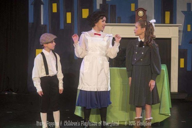 Sammy Jungwirth (left) as Michael Banks, Ilyssa Rubin (center) as Mary Poppins, and Madi Heinemann (right) as Jane Banks in Mary Poppins at Children's Playhouse of Maryland