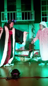 Katie Evans (left) as Ghost of Christmas Present and Annie Gorenflo (right) as Scrooge