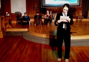 Melanie Glickman (front right) as Malvolio in Twelfth Night, with Alice Stanley (back left) as Feste, Matthew Payne (back center) as Sir Toby, and Caitlin Carbone (back right) as Sir Andrew Aguecheek.