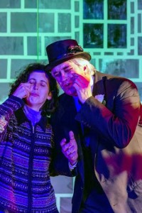 Deborah Steinig (left) as Mrs. Sowerberry and Nick Ruth (right) as Mr. Sowerberry rehearsing "That's Your Funeral" in Oliver! at Third Wall Productions