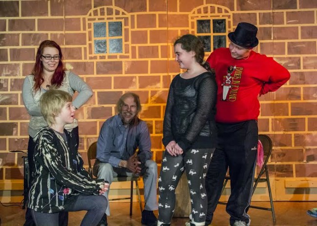 (L to R) Mea Holloway as Nancy, Andi Rudai as Oliver, James Fitzpatrick as Fagin, Grace Volpe as Bet, and William Zellhofer as Dodger, rehearsing for "I'd Do Anything" in Oliver! at Third Wall Productions