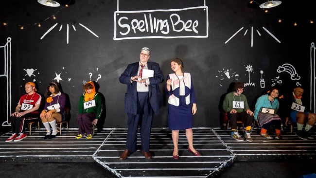 Danielle Robinette (center left) as Doug Panch and Zoe Kanter (center right) as Rona Lisa Peretti in The 25th Annual Putnam County Spelling Bee