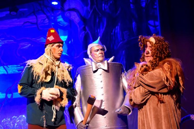 Jamie Austin Jacobs (left) as Scarecrow, Michael Quinn (center) as Tinman, and John Sheldon (right) as Cowardly Lion in The Wizard of Oz at Suburban Players