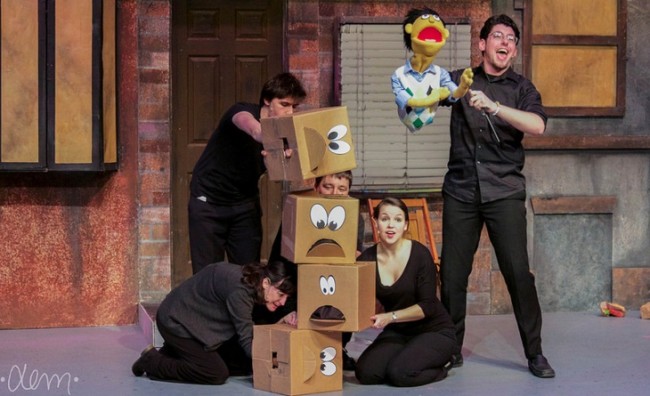 The ensemble of Avenue Q (L- Amanda Dickson, Samantha Murray, Josh Schoff, Matthew Wolffe) and William Meister (right) as Princeton singing "Purpose" 