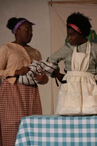 Zipporah Brown (left) as Vivian and Trustina Fafa Sabah (right) as Shilo in Harry and the Thief at Strand Theater Company