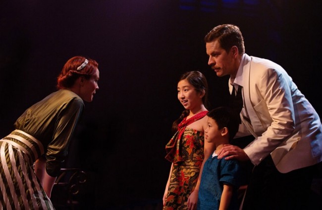 Teresa Danskey (left) as Nellie Forbush and Russell Rinker (right) as Emile de Becque in South Pacific at Toby's Dinner Theatre