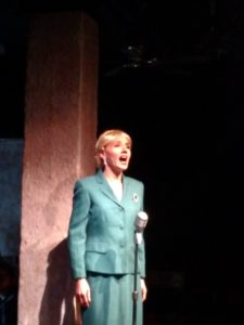 A tech-week rehearsal shot of Becca Vourvoulas as Eva Perón in Evita at Spotlighters Theatre