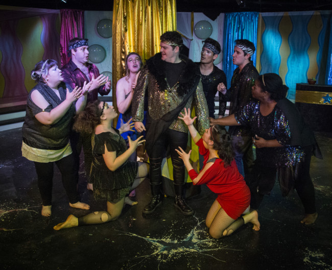 Jack Evans (center) as Oedipus and the ensemble of Oedipus Rox! at Maryland Ensemble Theatre