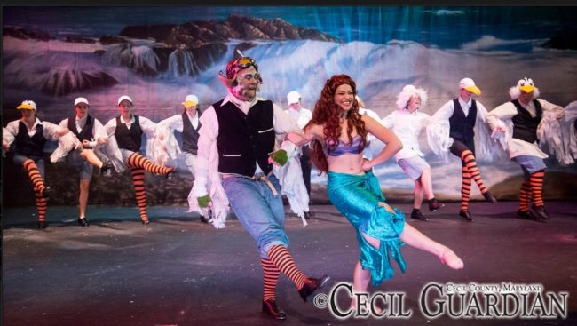 Dane Hutchinson (left) as Scuttle and Karalyn Joseph (right) as Ariel and the gulls tapping to "Positoovity" in The Little Mermaid