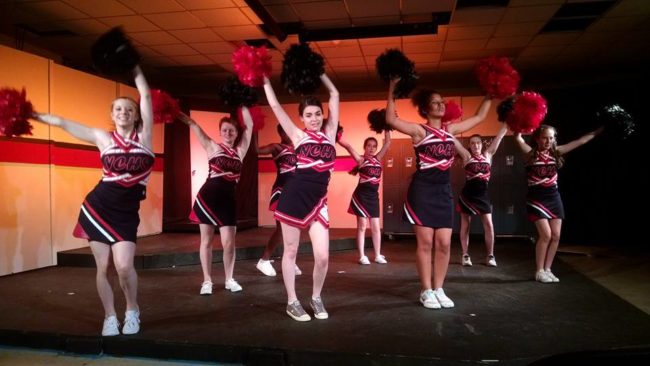 The Cheerleaders of 13: The Musical doing "Opportunity"