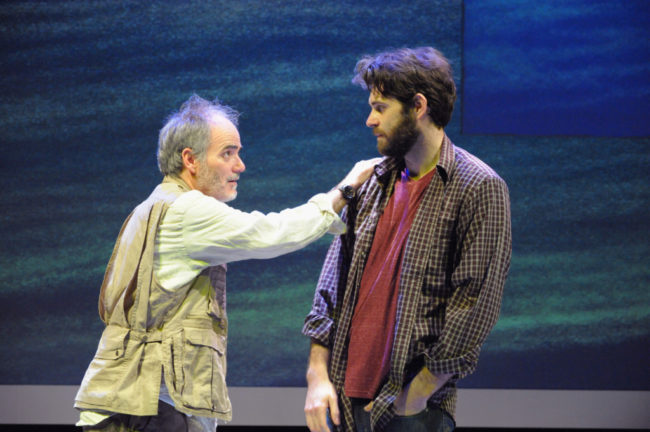 Eric Hissom (left) as Paul Watson and Thomas Keegan (right) as Dan O'Brien in The Body of an American at Theater J