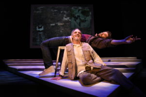 Thomas Keegan (above) as Dan O'Brien and Eric Hissom (below) as Paul Watson in The Body of An American at Theater J