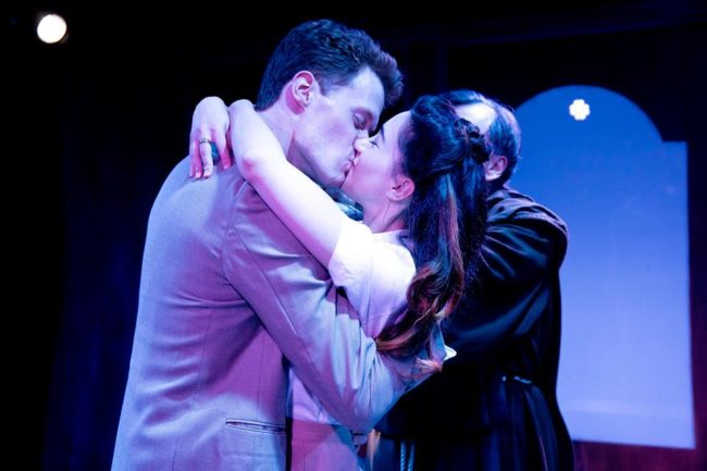 Brendan McMahon (left) as Romeo and Olivia Ercolano (right) as Juliet with Tony Tsendeas (behind) as Friar Laurence in Romeo & Juliet at Annapolis Shakespeare Company