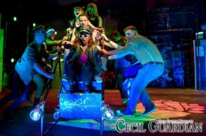 The cast of American Idiot performing "On Holiday" at Milburn Stone Theatre