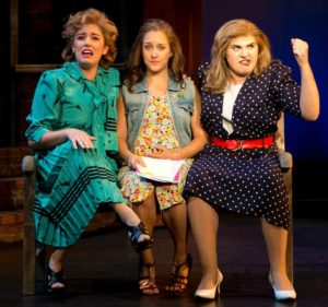 Ana Marcu (left), Lauren Wright (center) and Emily Freeman (right) performing "The Ladies Singing Their Song" in Baby at Infinity Theatre Company