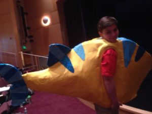 Logan Dubel as Flounder rehearsing for The Little Mermaid at Charm City Players