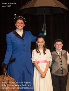 Brenda Tackett (left) as Mary Poppins with Sofia Bordner (center) as Jane and Daniel Koncurat (right) as Michael