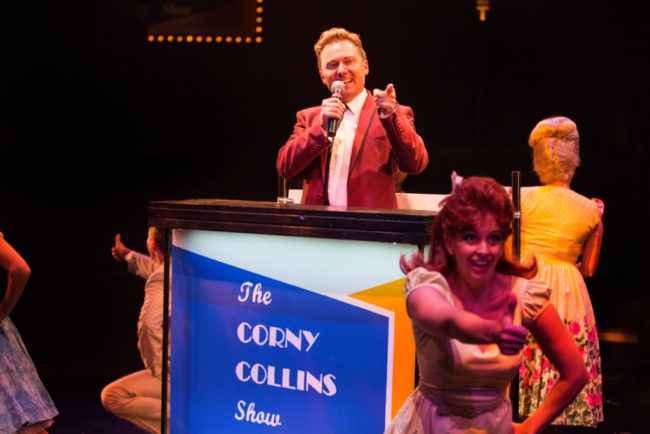 Jeffrey Shankle (center) as Corny Collins and the Council Member Kids in Hairspray