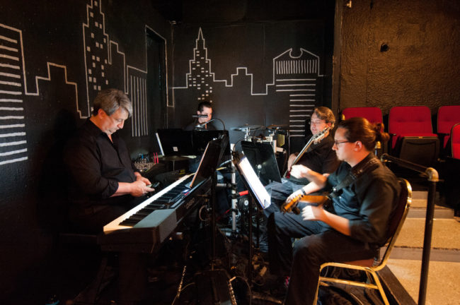 (L to R) Musical Director Michael W. Tan, Bassist Greg Bell, Guitarist Christine MacDonald, and Percussionist William Georg