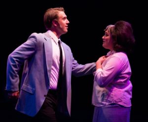 Justin Calhoun (left) as Link Larkin and Christie Graham (right) as Tracy Turnblad in Hairspray