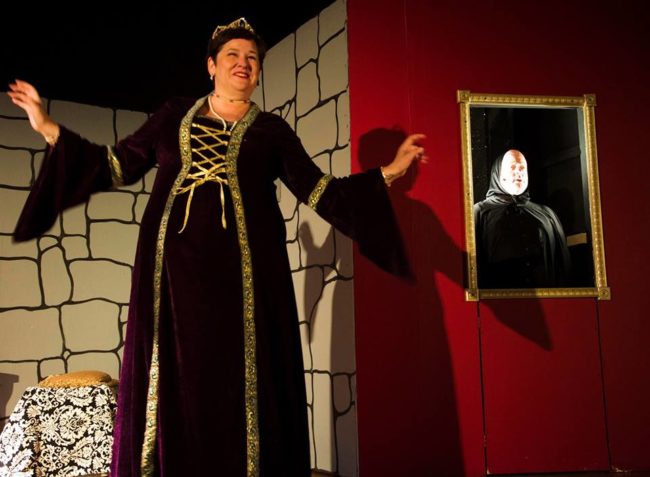 Andrea Bush (left) as The Queen and John Sheldon (right) as The Mirror in Snow White